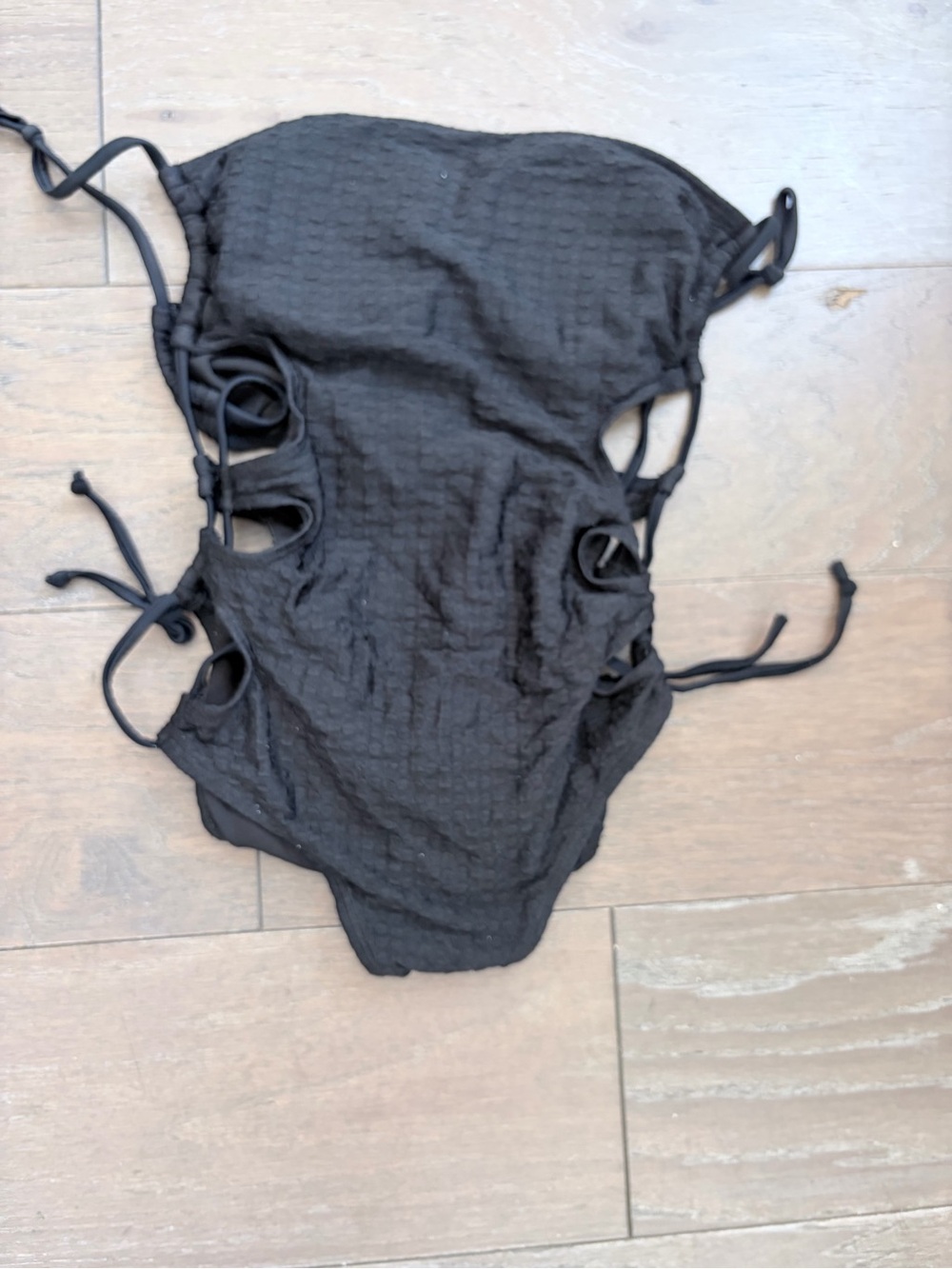 Black One-Piece Swimsuit with Side Tie Cutouts